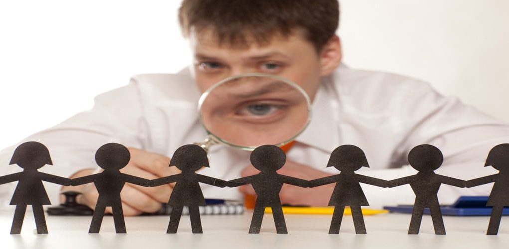 The,Boss,Looks,At,A,Group,Of,People.,Bureaucrat