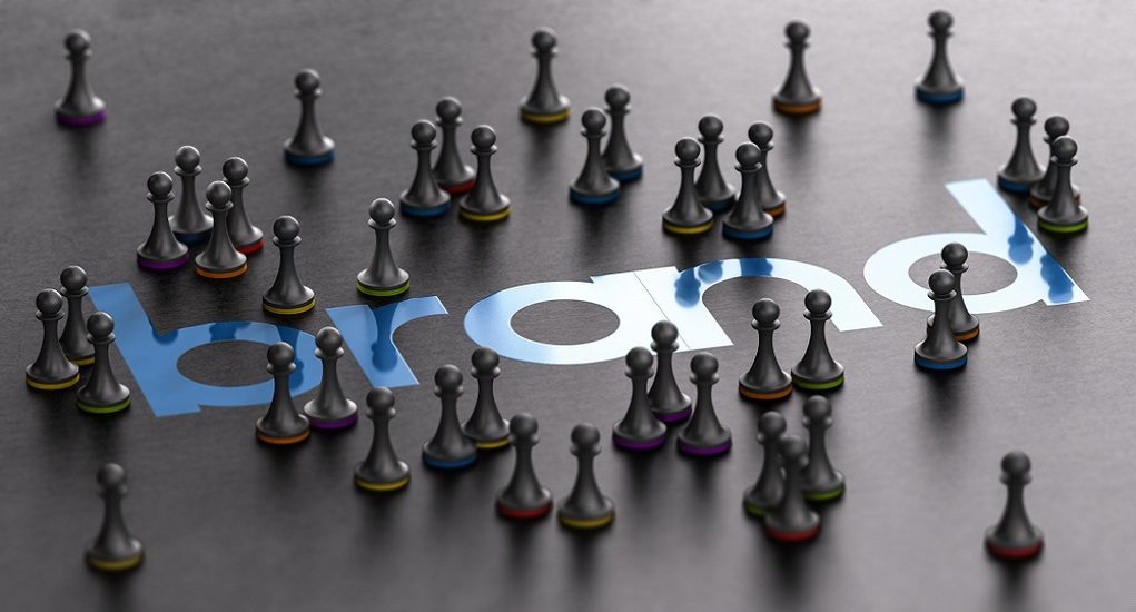 3d,Illustration,Of,A,Brand,Name,With,Pawns,Surrounding,It