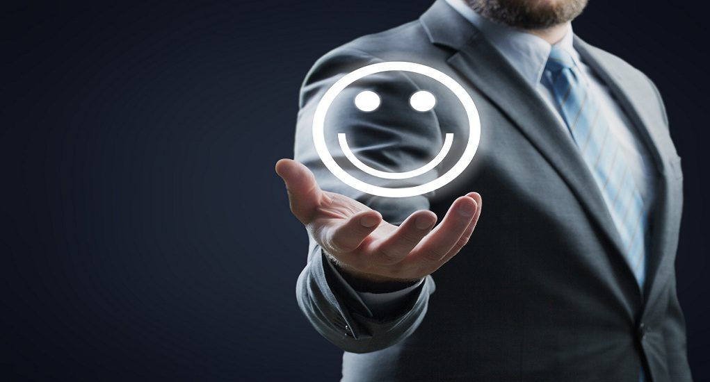 Businessman,Hold,A,Happy,Face,Icon,Drawn,On,Paper,,Customer